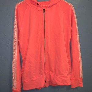 A pink long sleeve zip up